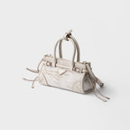 Prada Bonnie small printed linen and leather handbag